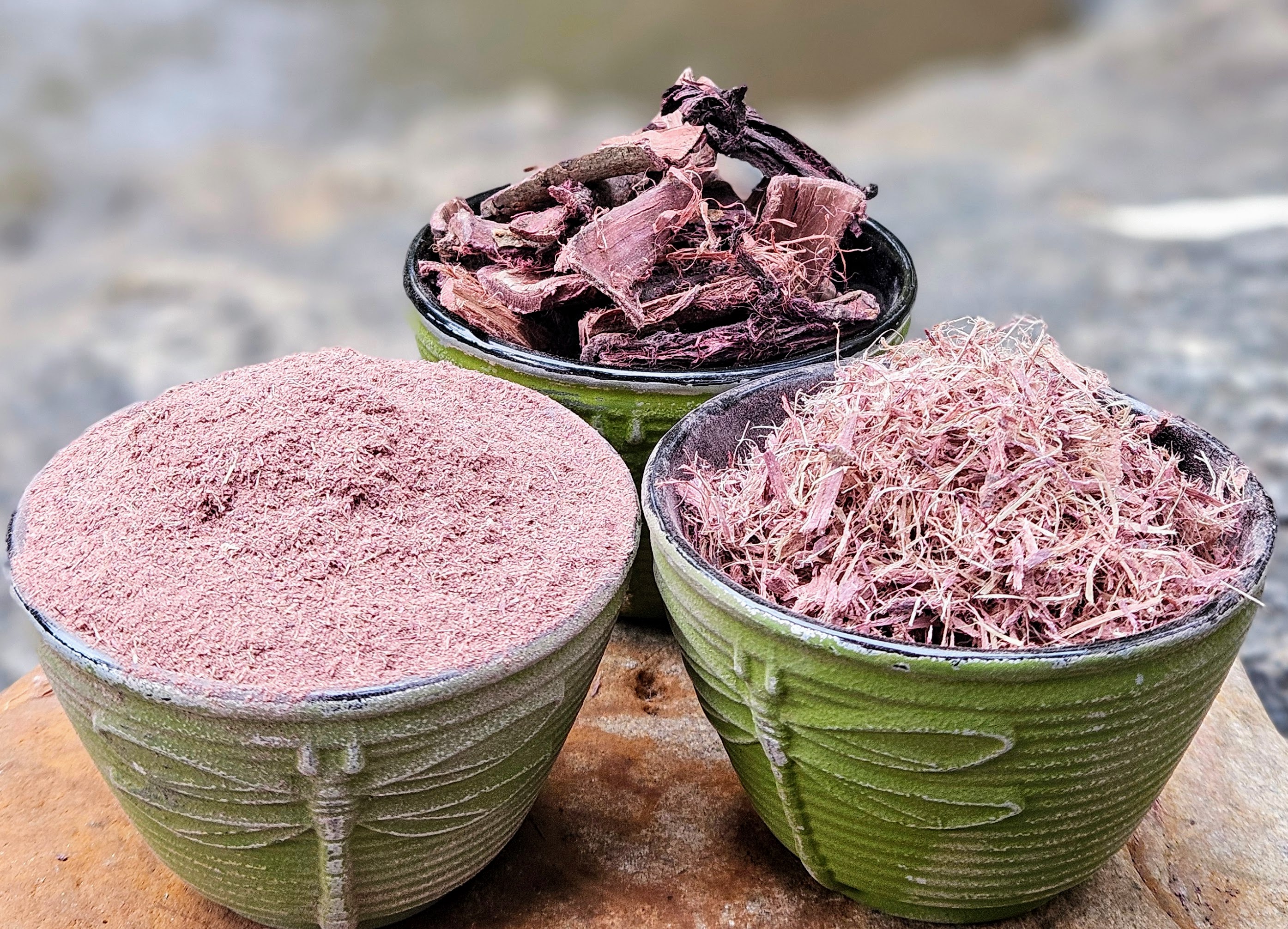 All three forms of Mimosa Hostilis root bark — chips, shredded, and powder — in wooden bowls